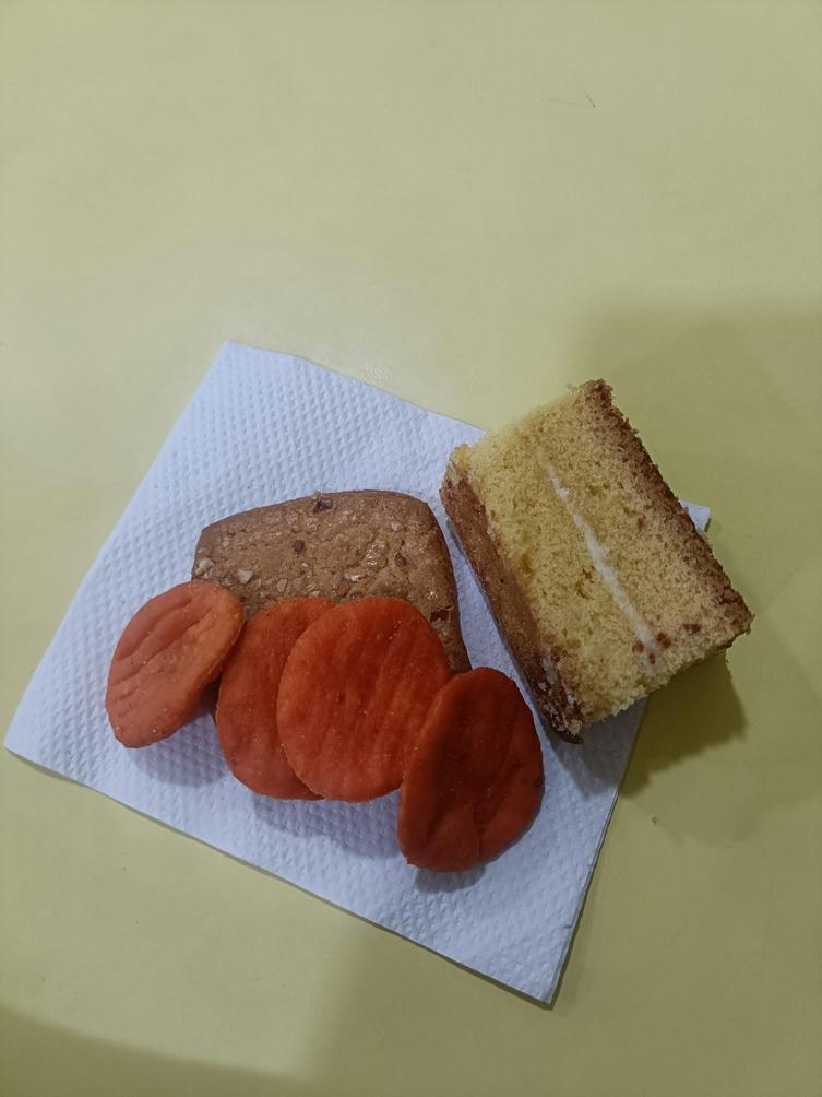 nammoura cake with almonds served on a decorative plate